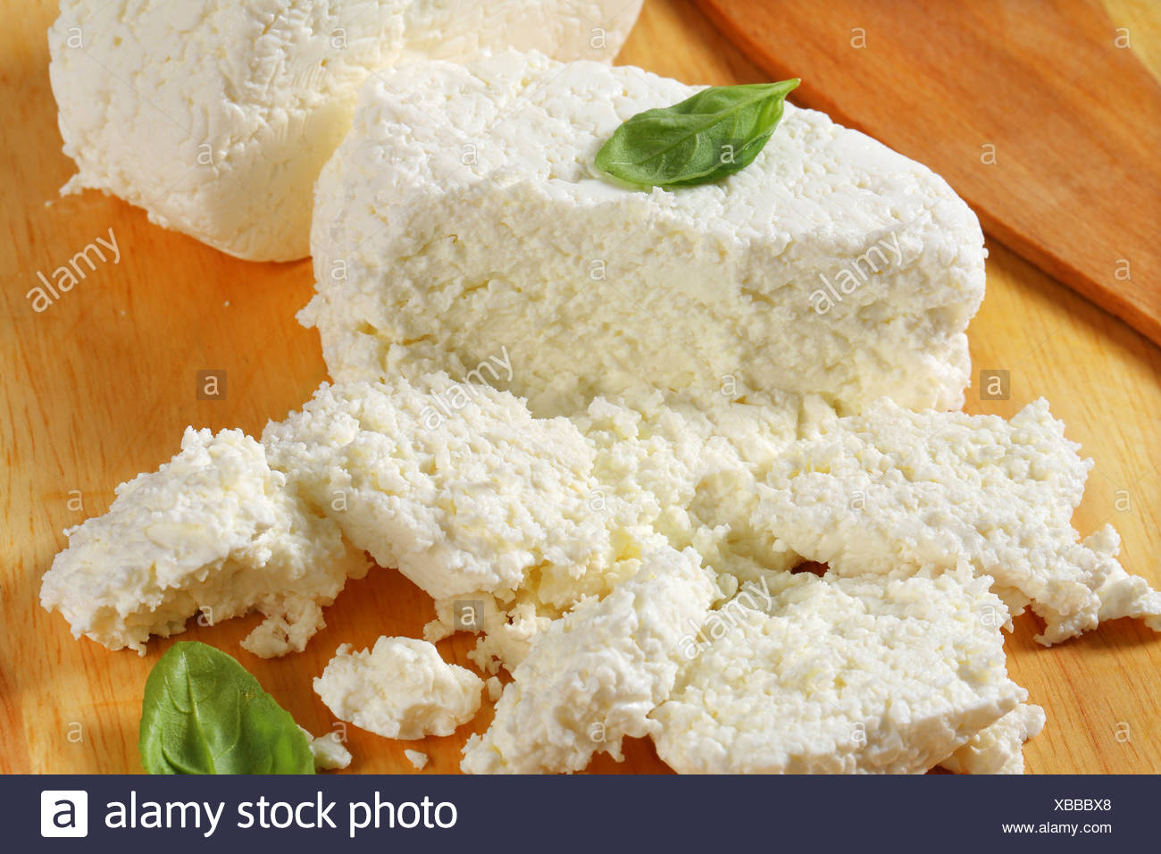 Pieces Of Cottage Cheese On A Cutting Board Stock Photo 282377936