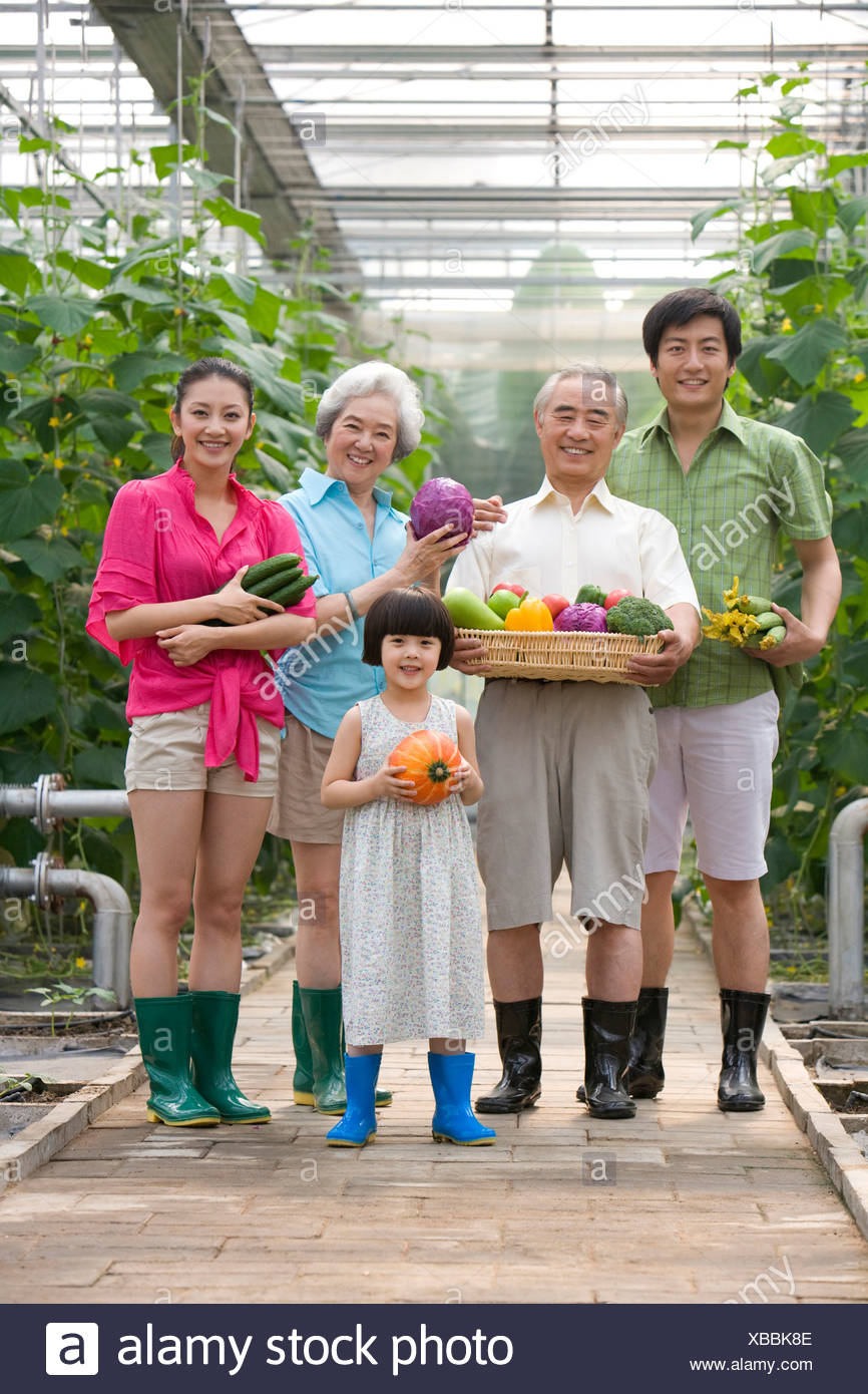 Family gardening in modern farm Stock Photo