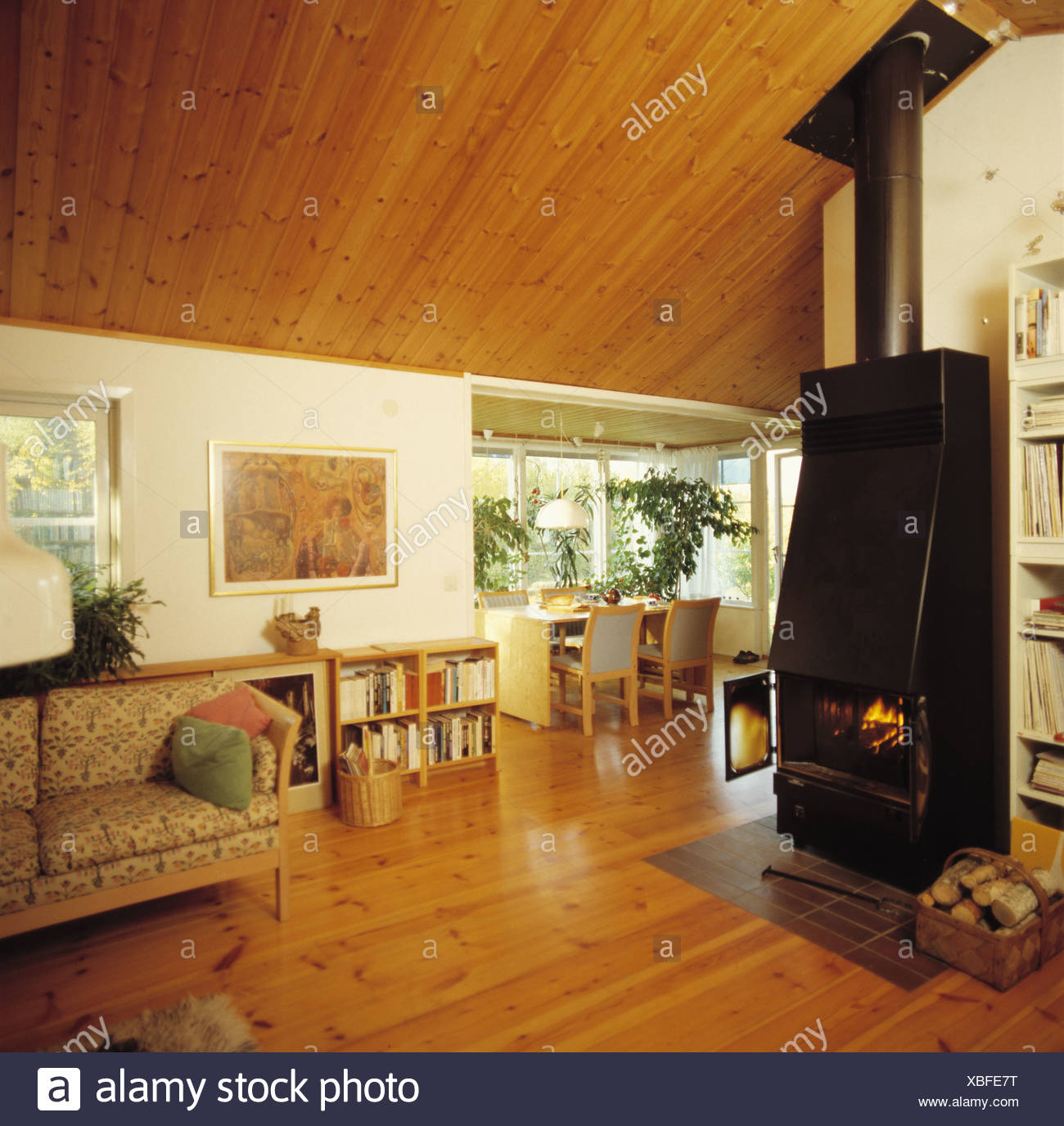 Large Cast Iron Stove And Wooden Flooring In Scandinavian