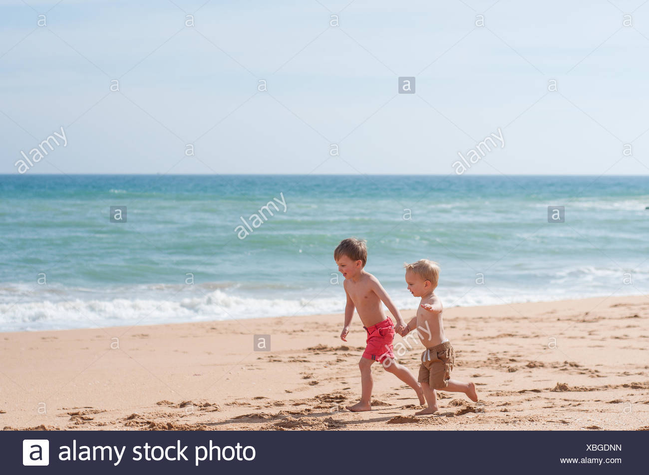Two Boys Holding Hands High Resolution Stock Photography and Images - Alamy