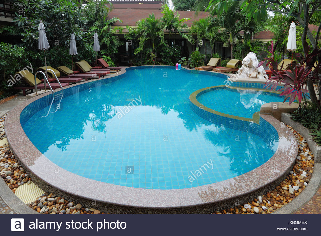 Whimsically Curved Pool With Clear Water Stock Photo Alamy