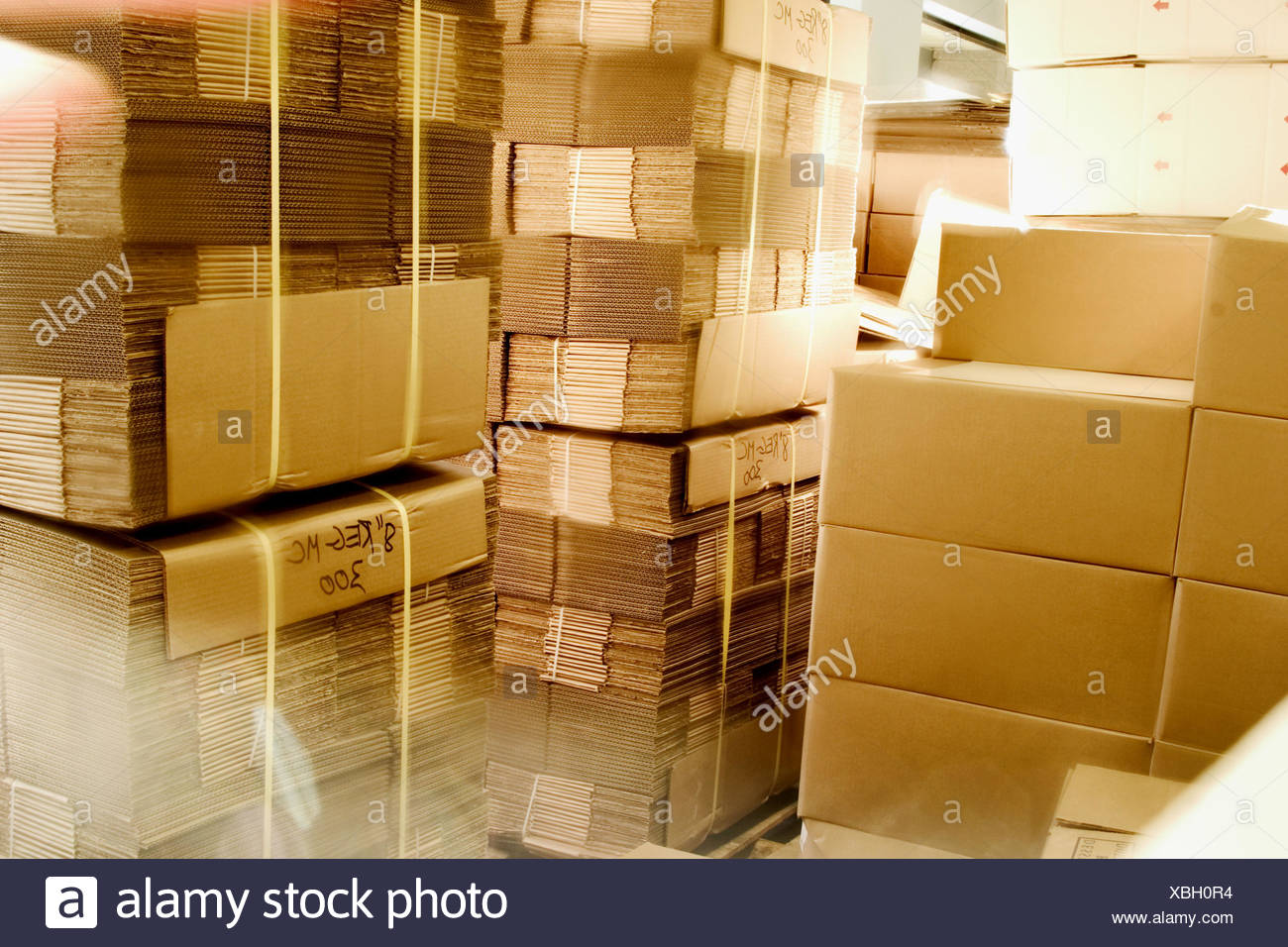 Download Stacks Of Unfolded Cardboard Boxes Stock Photo Alamy