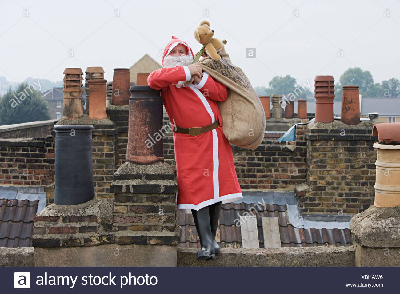 Santa Claus Delivering Gifts High Resolution Stock Photography and