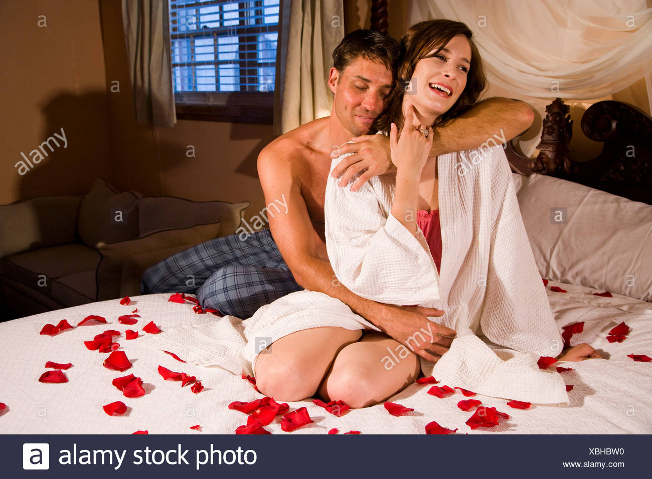 Woman On Bed Rose Petals High Resolution Stock Photography And Images Alamy