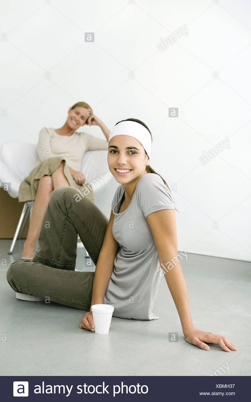 Girl Sitting On The Ground High Resolution Stock Photography and Images ...