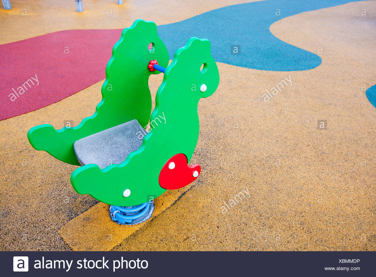 Playground Horse With Colored Rubber Flooring Stock Photo