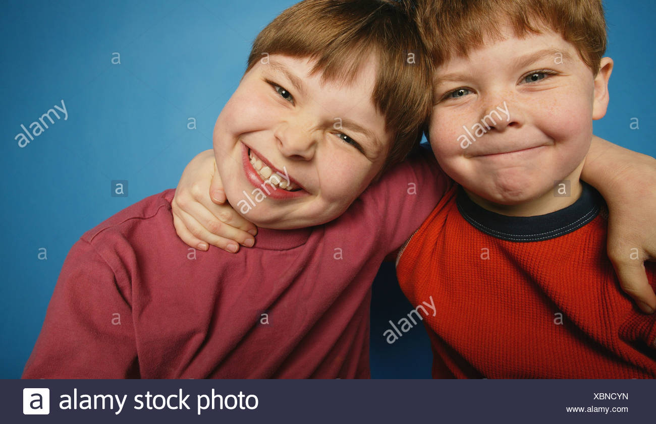 Two Boys 12 13 Arms Around High Resolution Stock Photography and Images ...