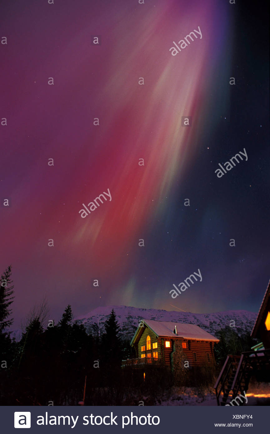Northern Lights Over Cabin Girdwood Sc Ak Winter Stock Photo