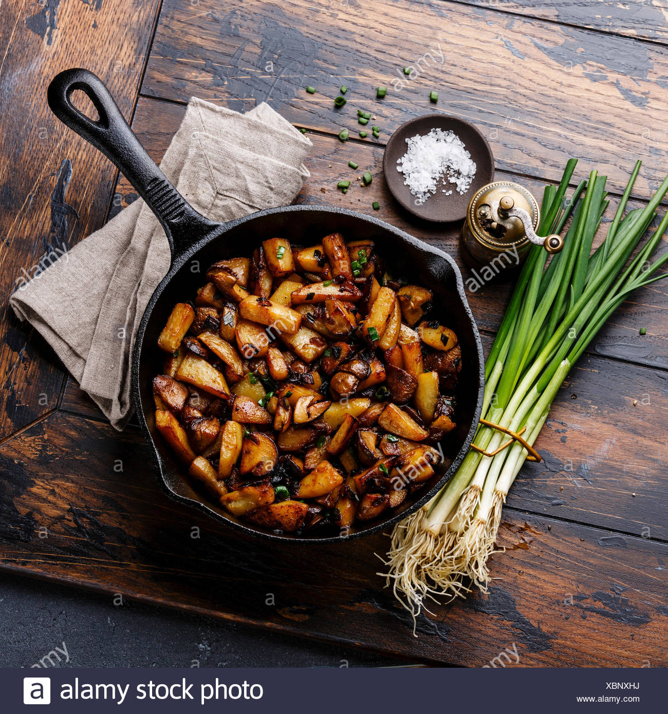Fried Potatoes Roasted With Porcini Mushrooms In Cooking Pan On Wooden Background Stock Photo Alamy,Italian Parsley Vs Parsley