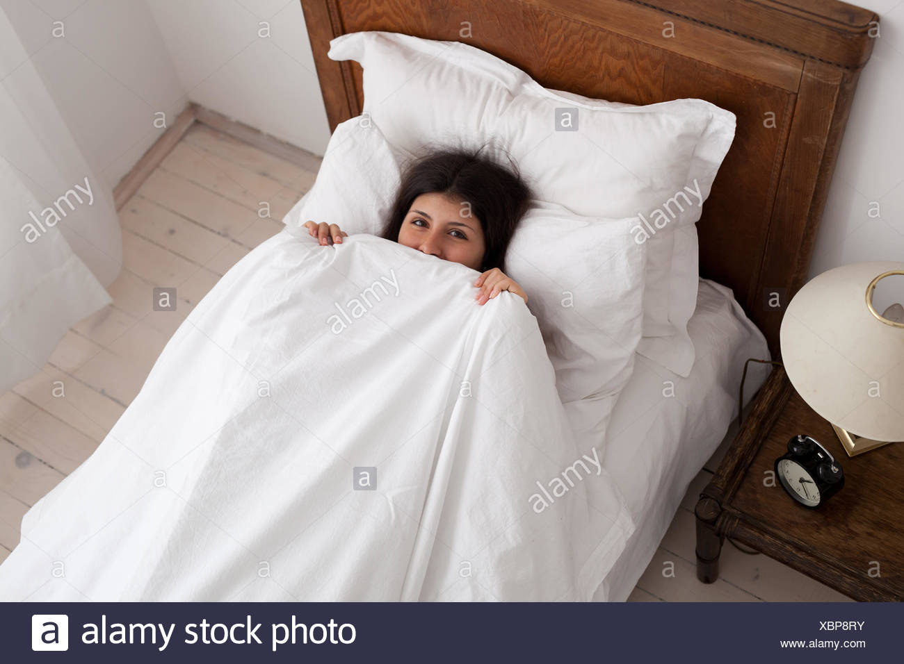 Hiding Under Bed Covers Stock Photos & Hiding Under Bed Covers Stock