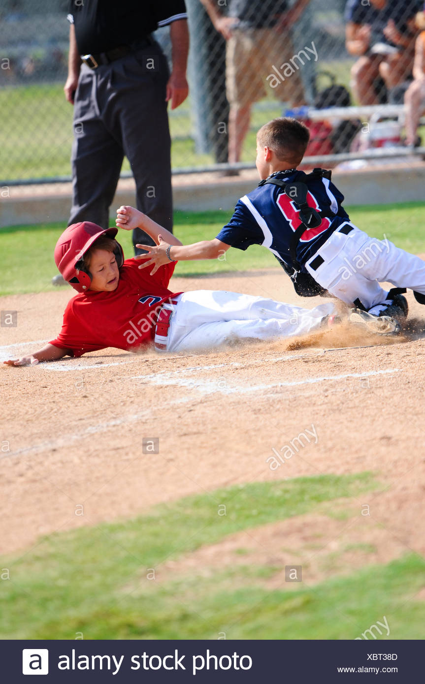 Baseball Player Sliding Stock Photos & Baseball Player Sliding Stock