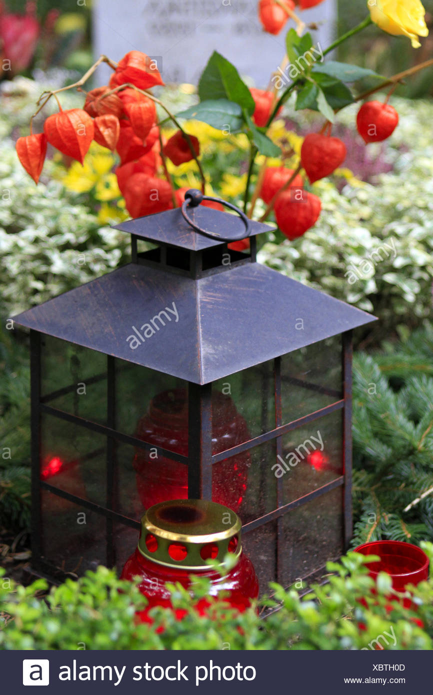 Geschmuecktes Grab auf einem Friedhof an Allerheiligen Stock Photo