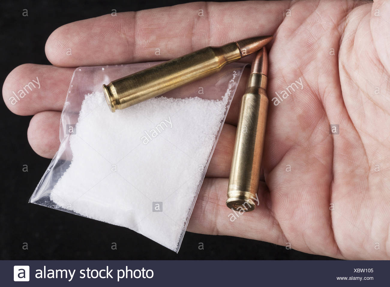 Hand Holding Bullets Cartridge Bullet High Resolution Stock Photography and Images Alamy
