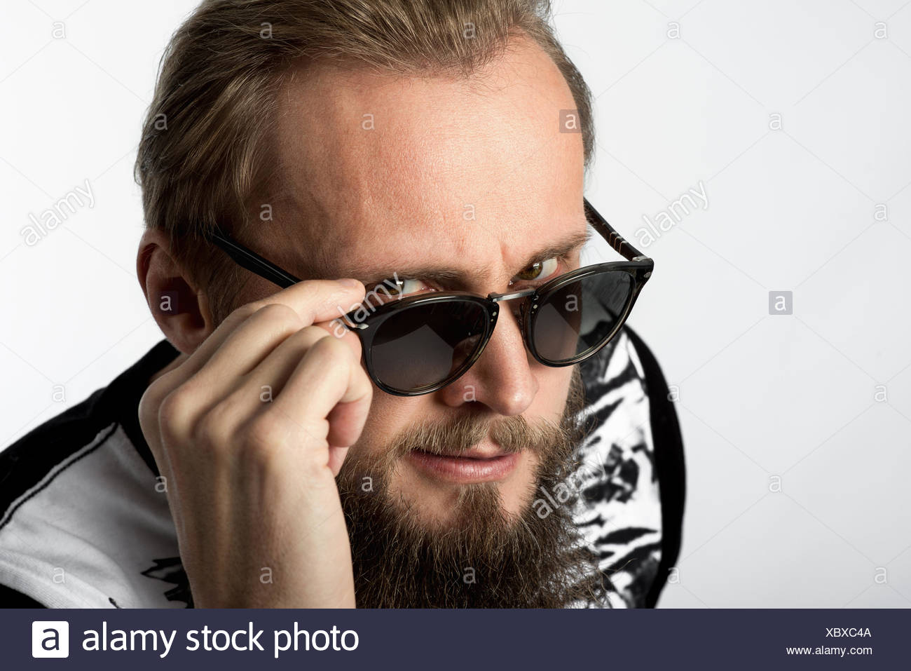 Man Looking Over Sunglasses Stock Photo Alamy Man Looking Over Sunglasses Stock Photo Alamy