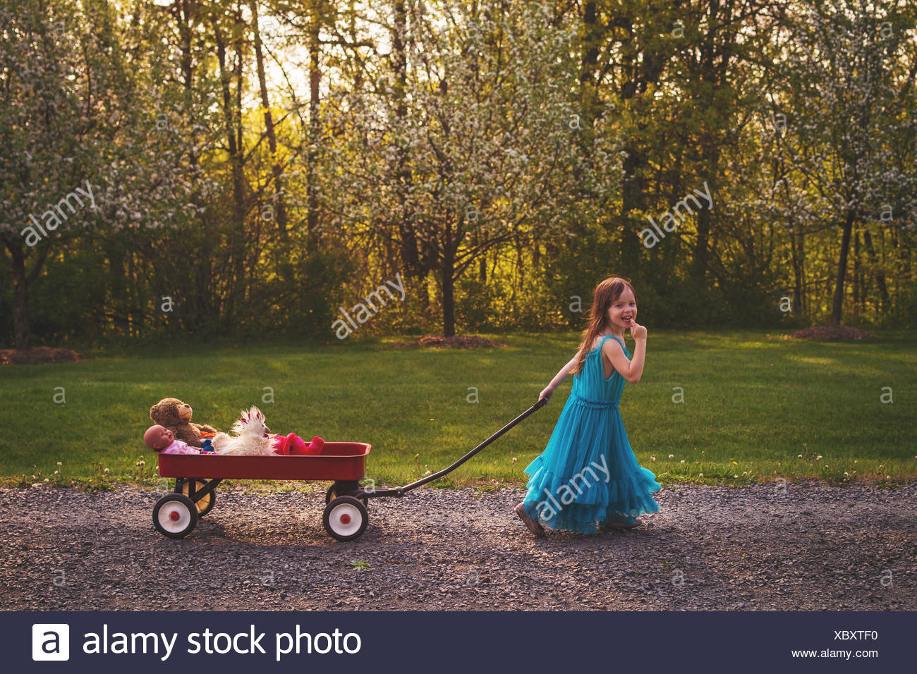 girl pulling wagon