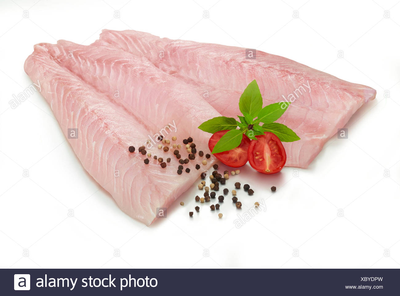 Fillets Of Nile Perch Lates Niloticus Peppercorns Piperaceae Tomato Solanum Lycopersicum And Mint Mentha Sp Stock Photo Alamy