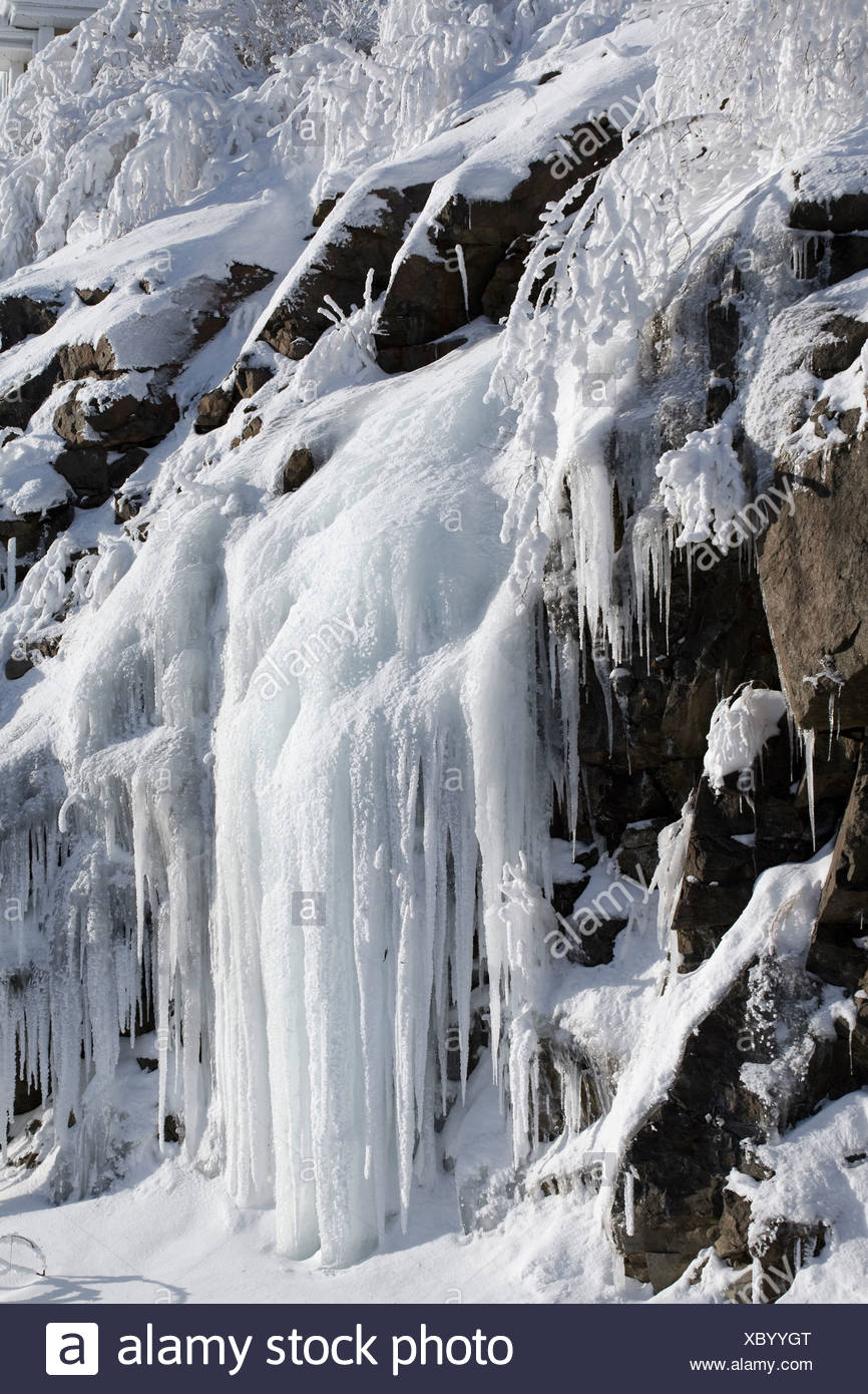 Snowy Rocks Icicles Winter Canada Stock Photo Alamy