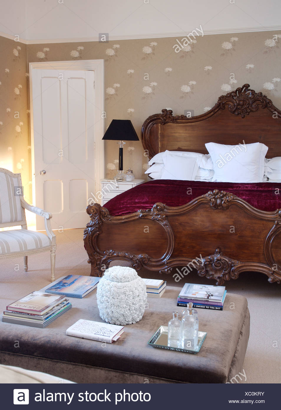 Ornate Mahogany Rococo Style Bed In Country Bedroom With