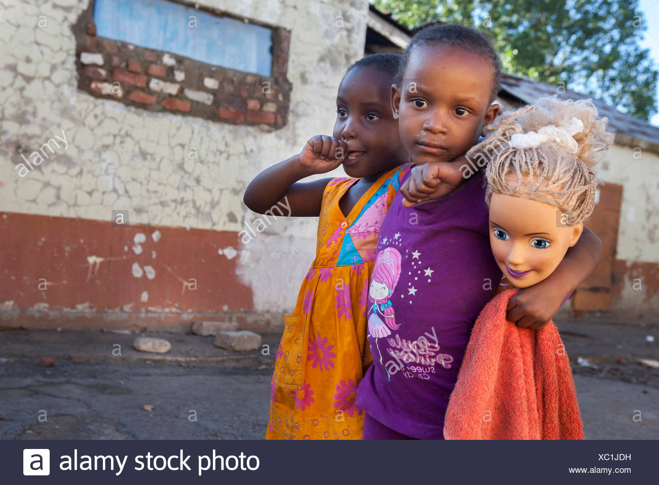 little girls and dolls