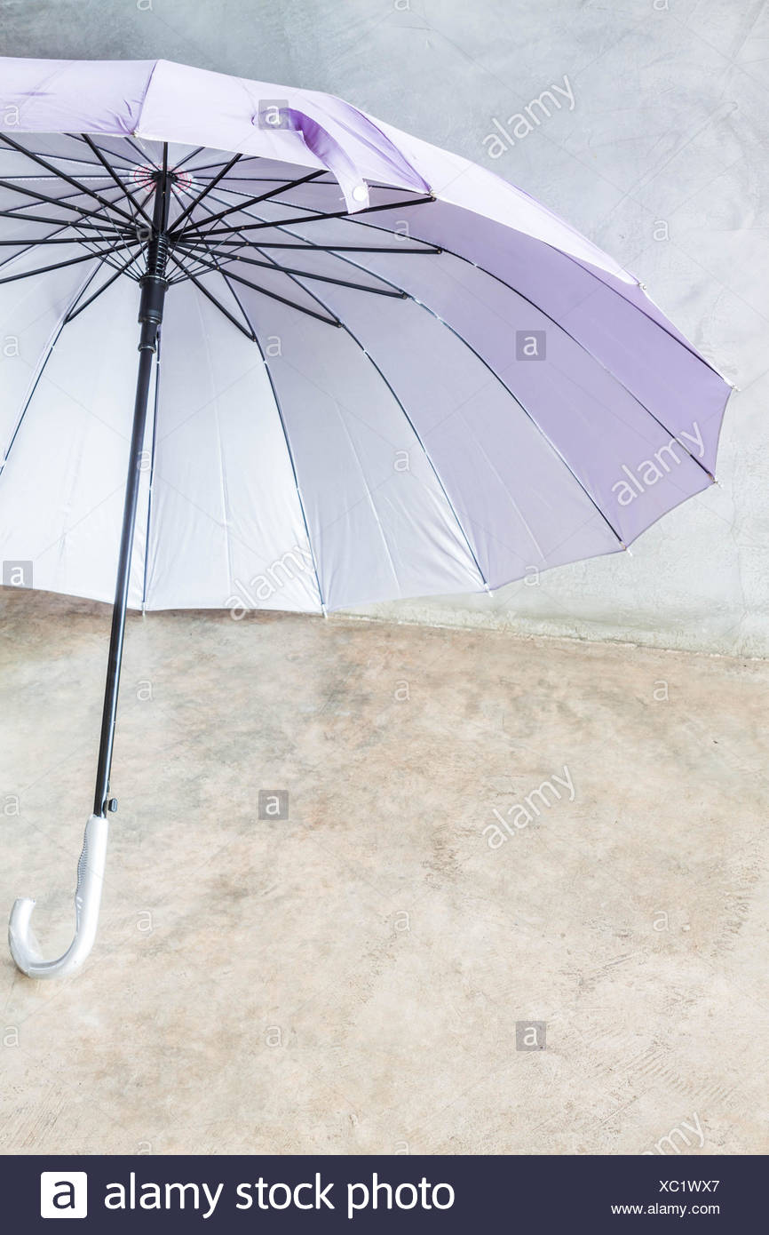 Violet Silver Bronze Uv Protection Umbrella On The Floor Stock