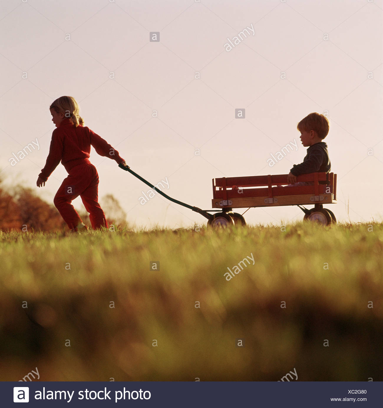 Brother Sister Playing Wagon High Resolution Stock Photography and ...