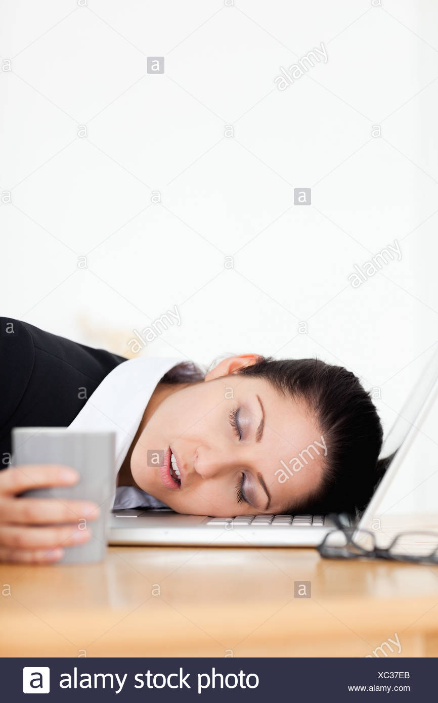 Businesswoman Sleeping In Office Chair High Resolution Stock