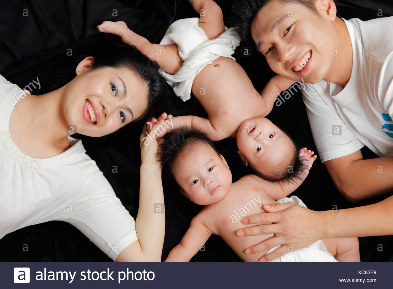 Twin Babies And Father High Resolution Stock Photography And Images Alamy