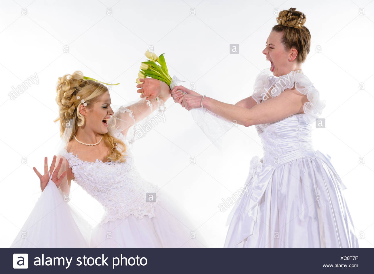 Two Young Brides In White Wedding Dresses Fight Against Each Other