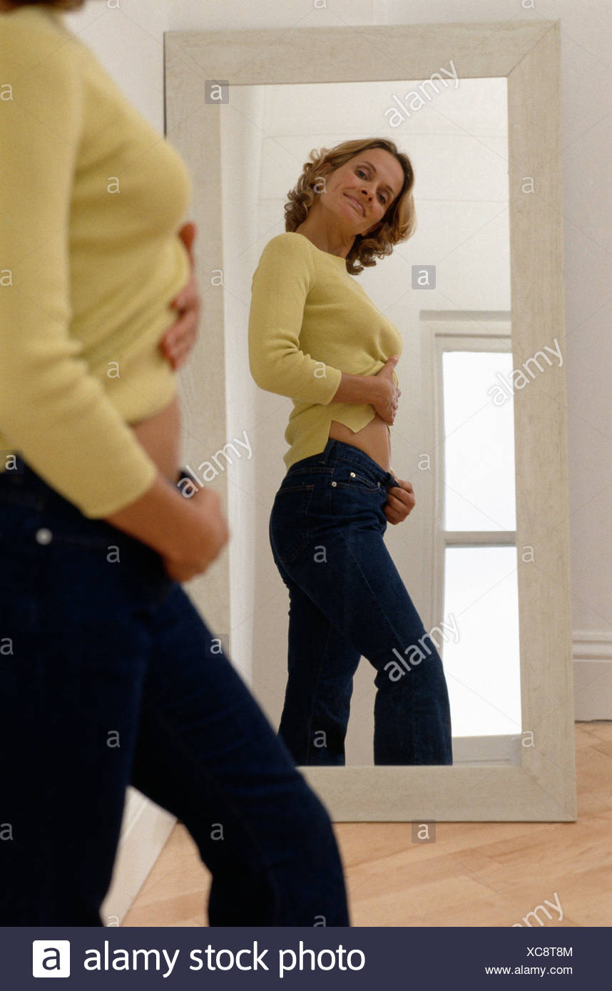 yellow jumper blue jeans