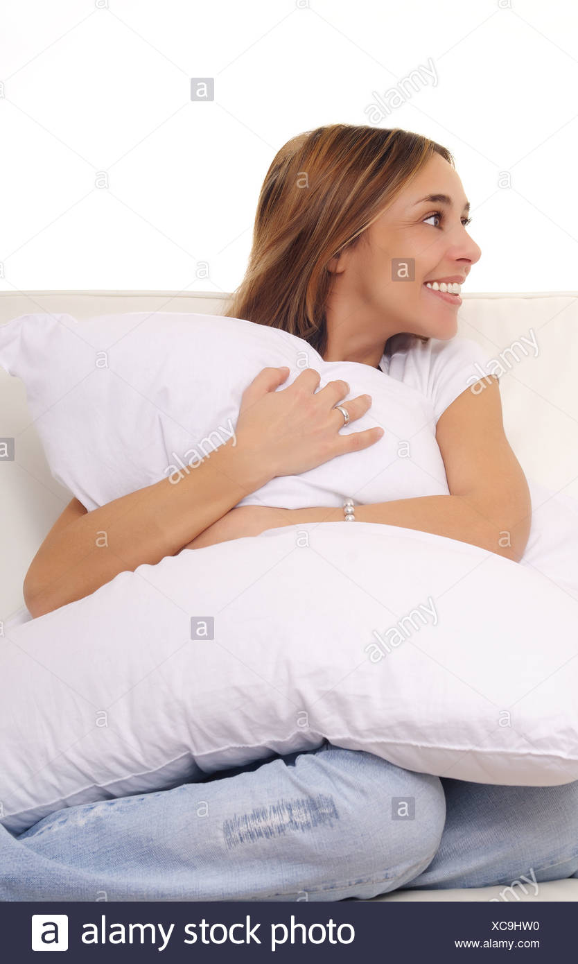 Mature Lady Cuddling A Pillow On Couch Stock Photo 282953356 Alamy