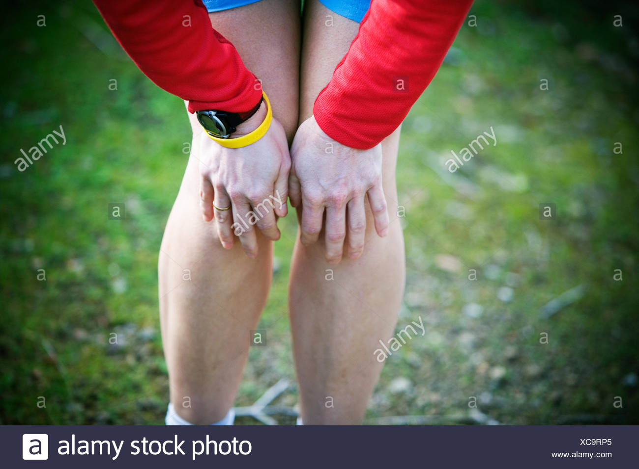 Human Hands On Knee Stock Photos & Human Hands On Knee Stock Images Alamy