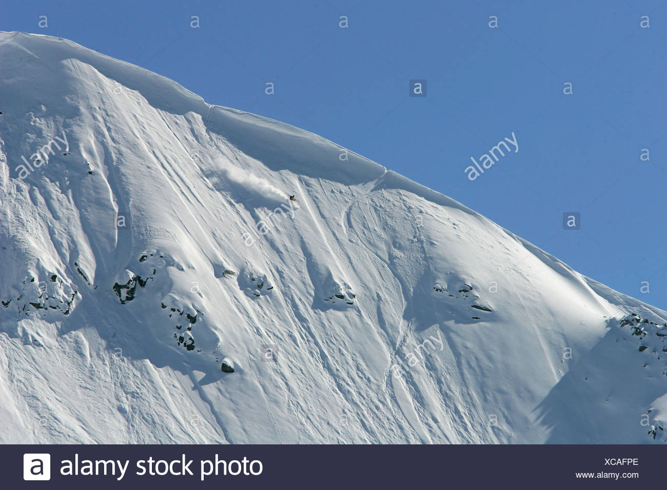 Free Skiing With Ski Traces Above A Cornice In Ski Resort Bansko