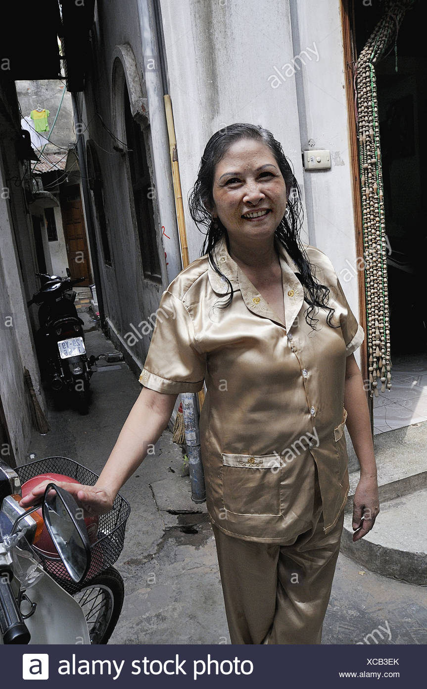 Woman in silk pyjama in an alley in Hanoi, Vietnam 2008 Stock ...