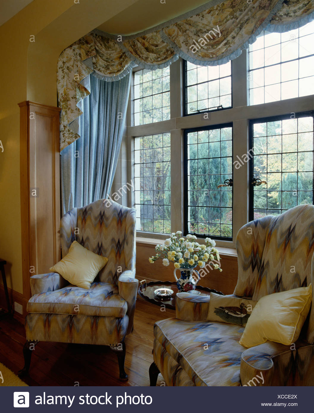 Armchairs Upholstered In Blue Florentine Panel In Front Of Large