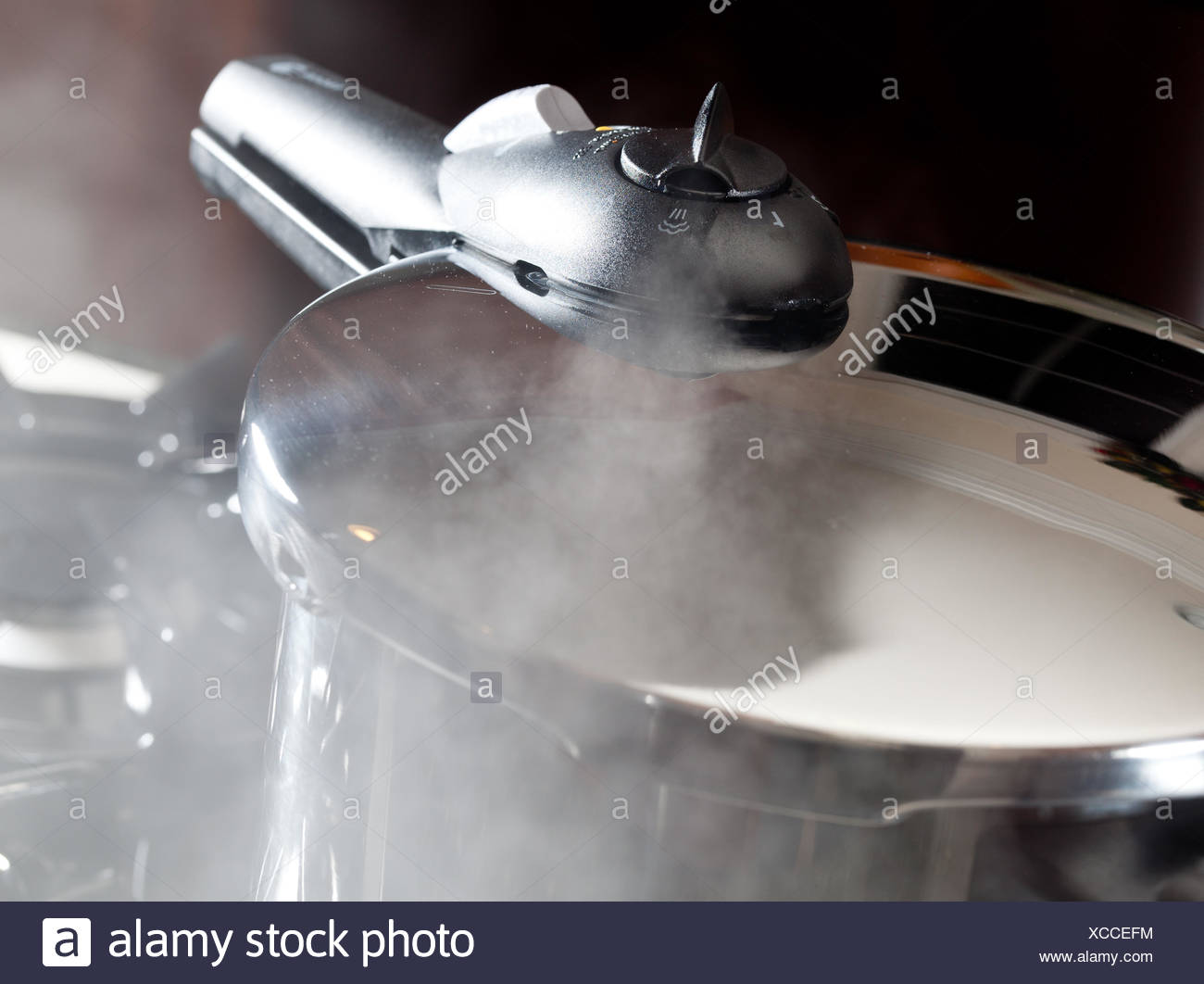 Pressure Cooker Steam Escaping High Resolution Stock Photography and
