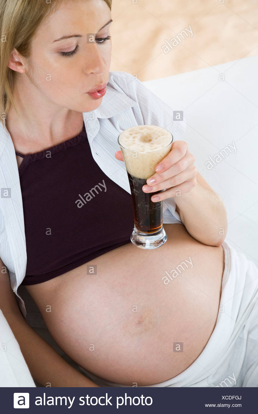 Pregnant Woman Drinking Non Alcoholic Beer Stock Photo Alamy