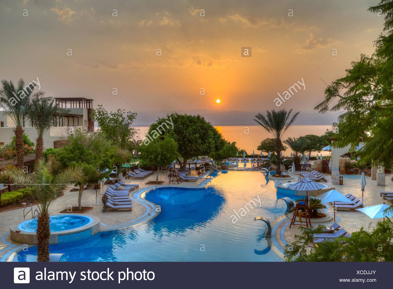 The Marriott Hotel resort at sunset on the Dead Sea, Hashemite Kingdom of  Jordan, Middle East Stock Photo - Alamy