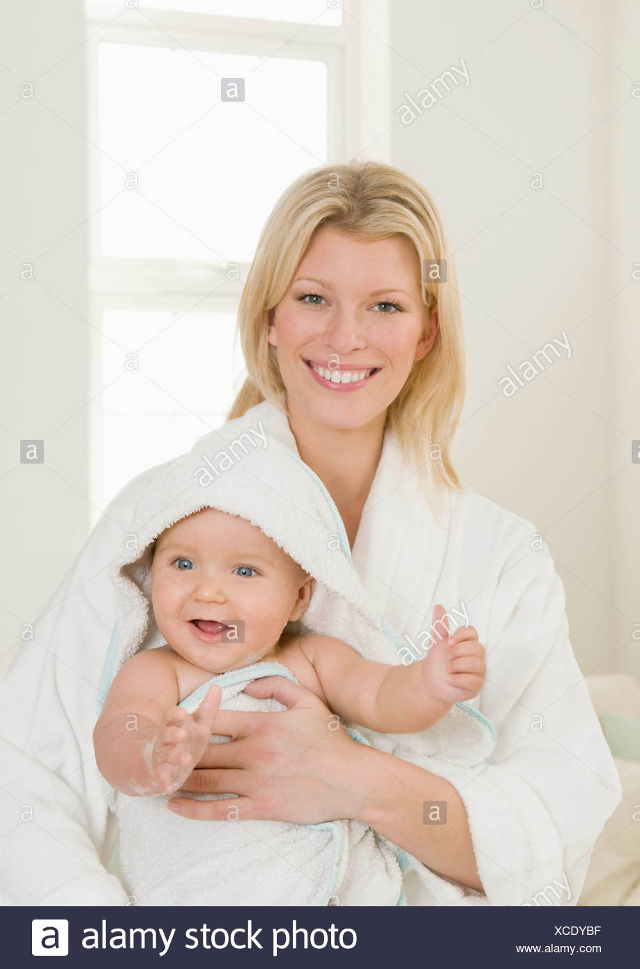 baby holding towel