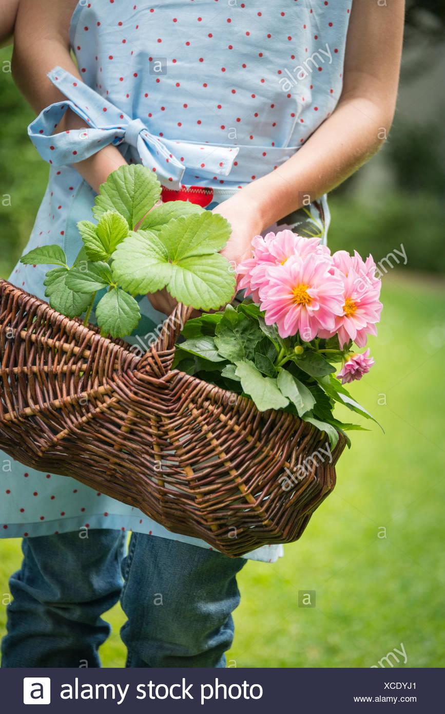 girl with a basket of flowers