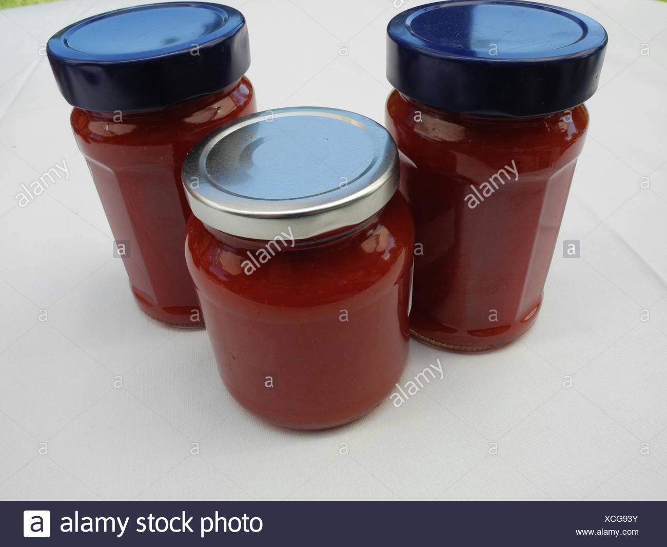 Download High Angle View Of Fresh Strawberry Jam Jars On Table Stock Photo Alamy Yellowimages Mockups