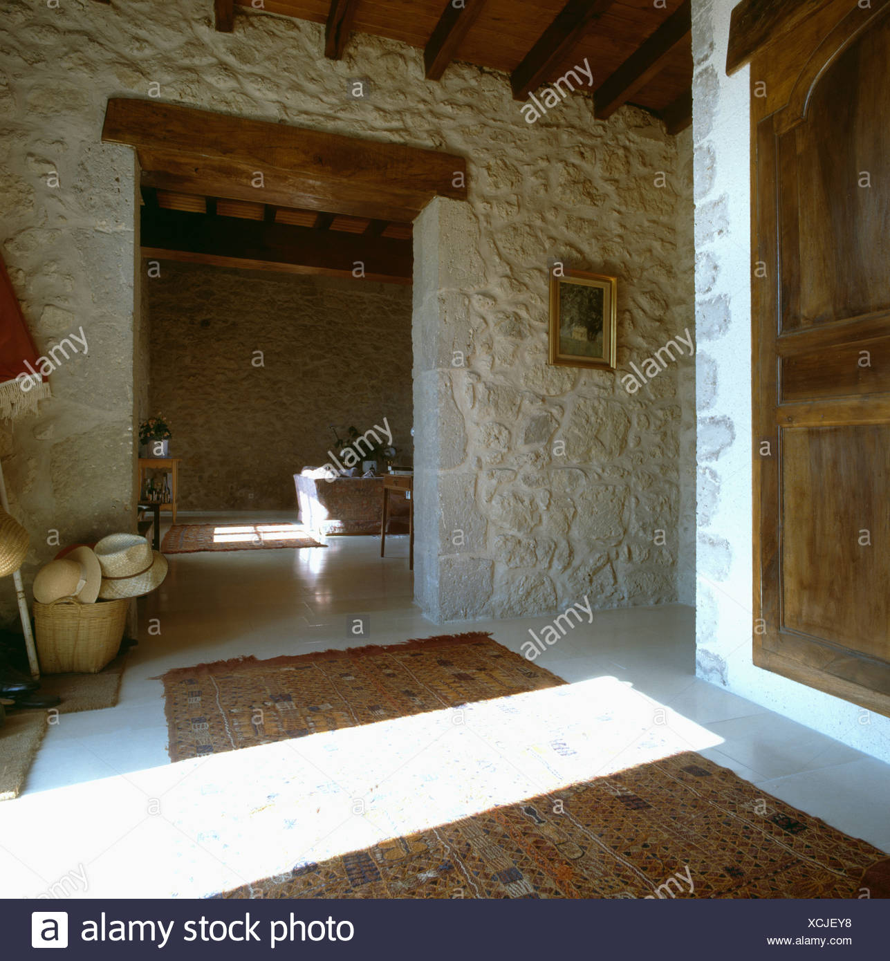 Stone Walls And Shaft Of Sunlight On Floor Of Rustic French