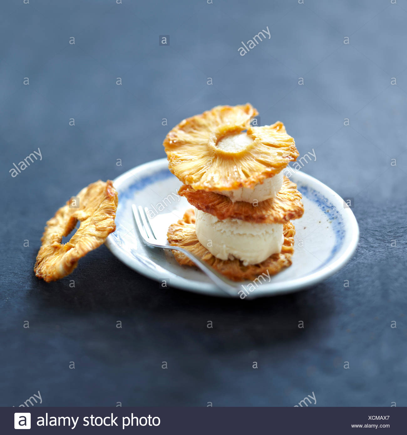 Sliced Fried Pineapple And Coconut Ice Cream Dessert Stock Photo Alamy