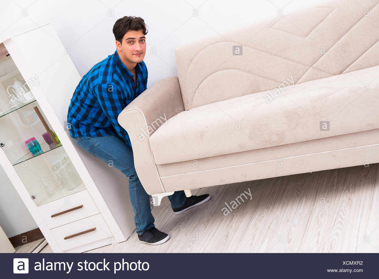 Young Man Moving Sofa Couch Stock Photo 283201830 Alamy