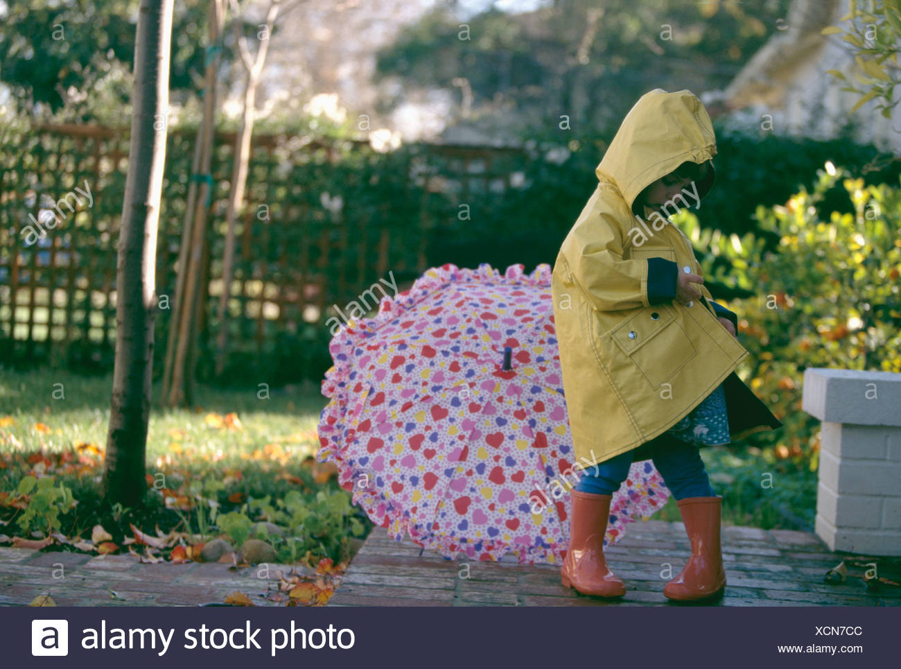 girl rain boots and raincoats
