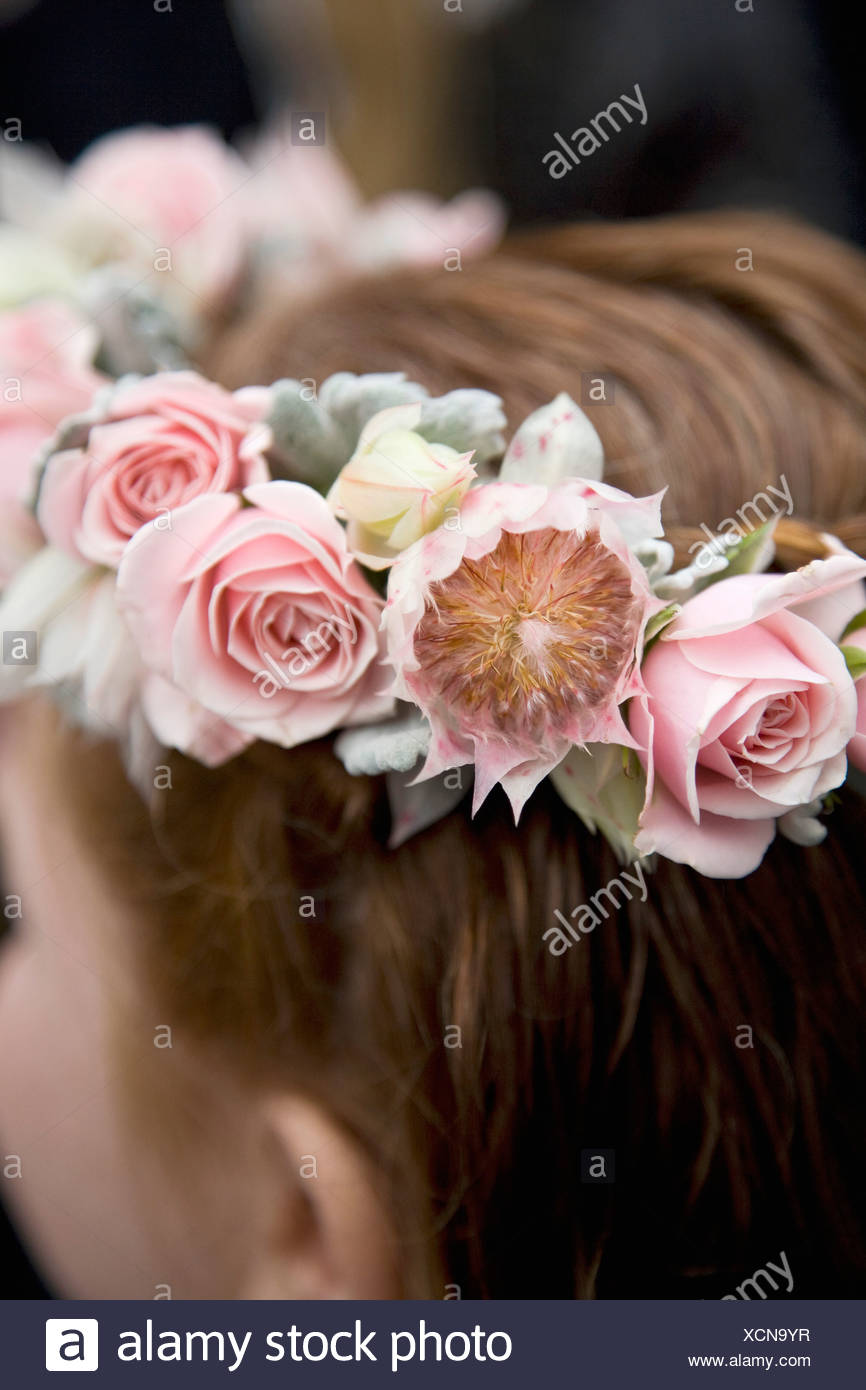 Rear view detail of a girl wearing a floral wreath Stock Photo