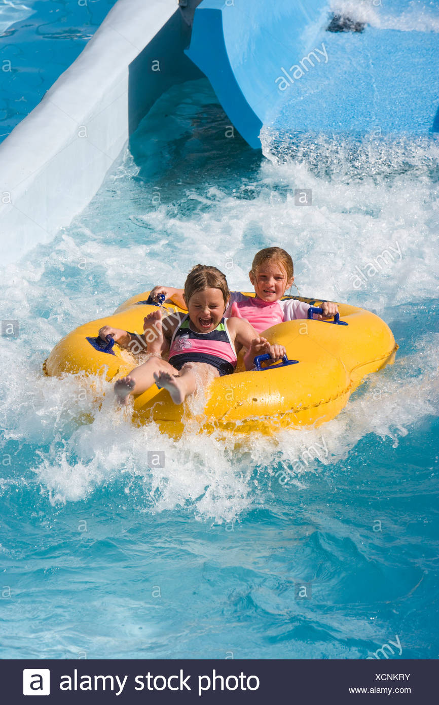 People Playing On Floating Innertube High Resolution Stock Photography