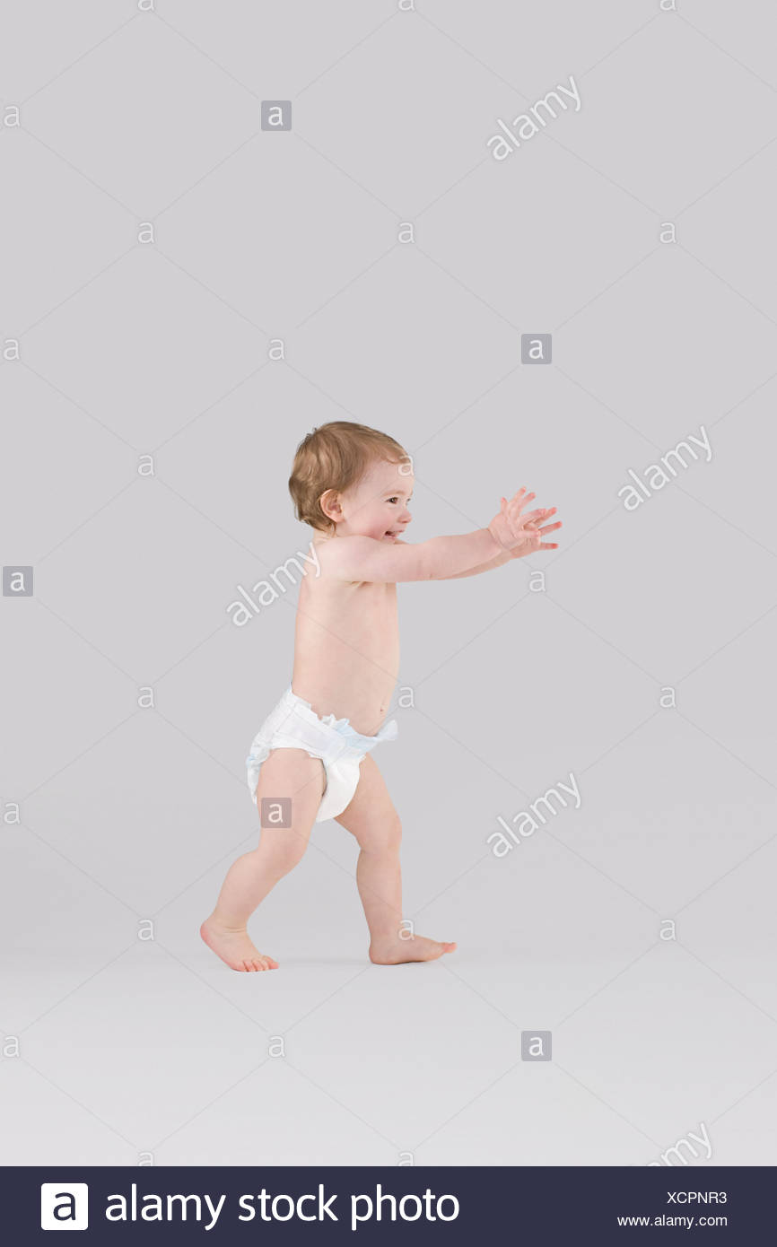 Toddler Walking Diaper Stock Photos & Toddler Walking Diaper Stock