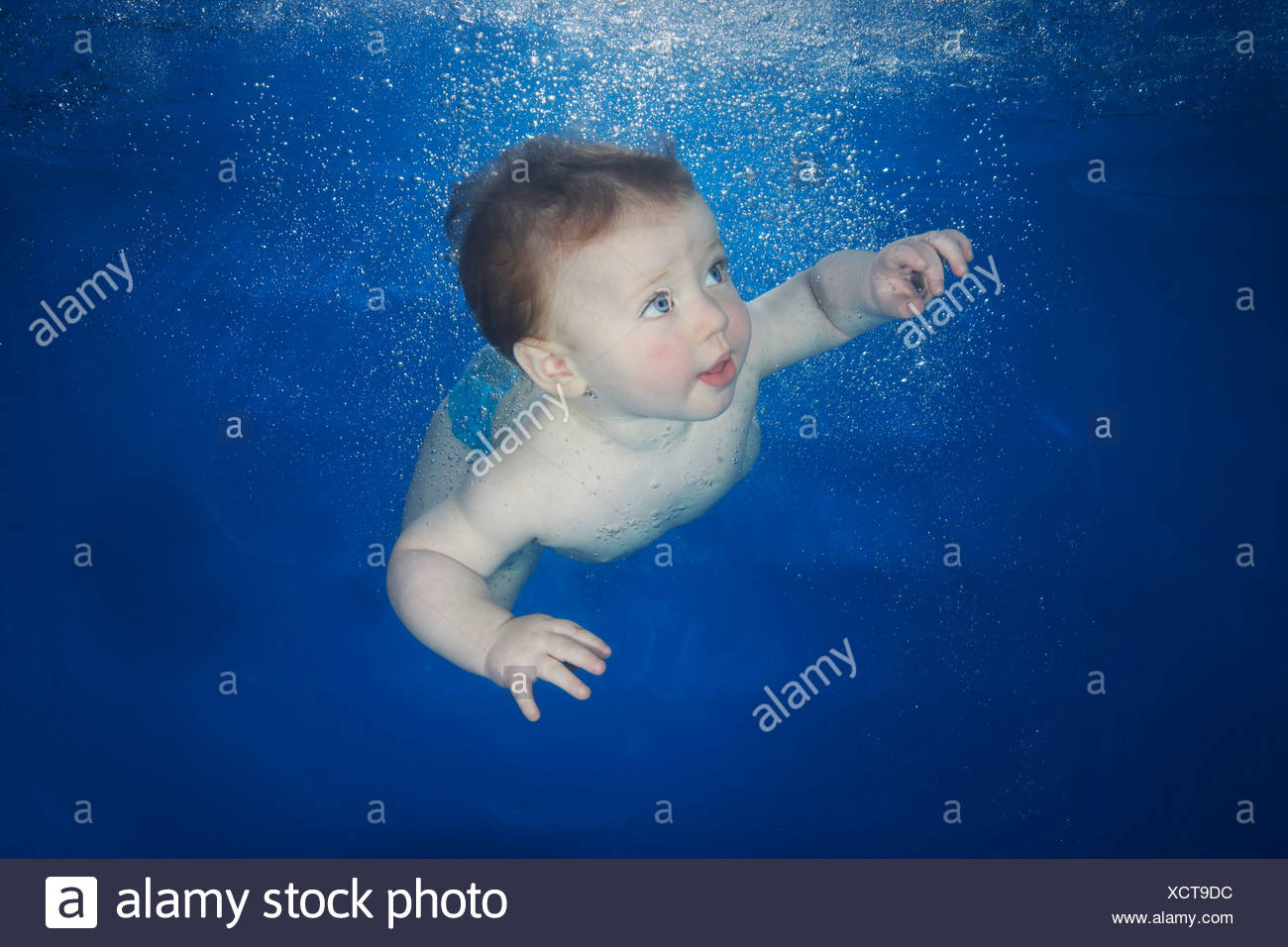 small boy swimming