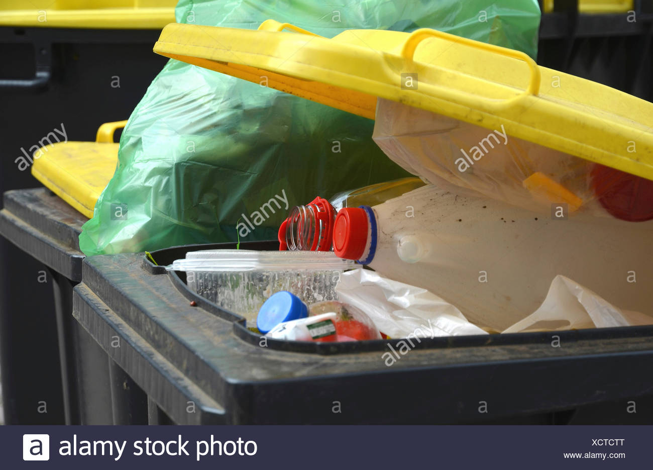 Yellow Recycling Bin Stock Photos & Yellow Recycling Bin Stock Images