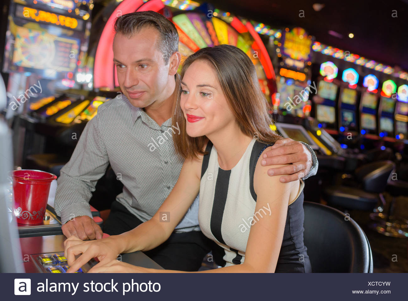 couple playing in casino Stock Photo - Alamy